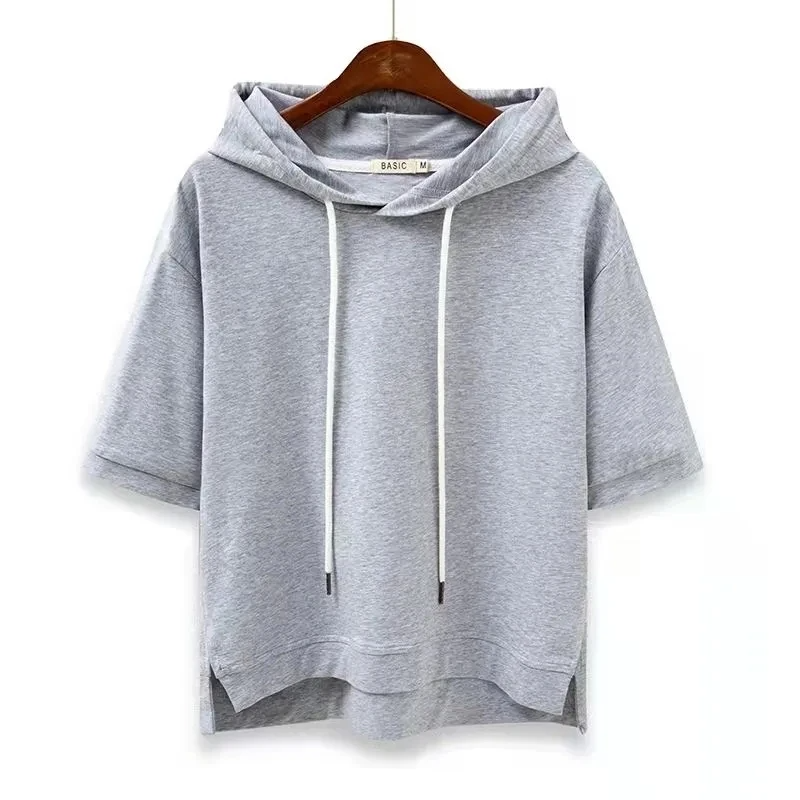 Women's short sleeve boxy fit hoodie in breathable cotton blend. Relaxed casual top with hood, everyday wear.