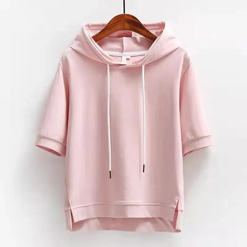 Stylish women's short sleeve boxy hoodie, ideal for spring/summer fashion. Breathable, relaxed fit casual top.