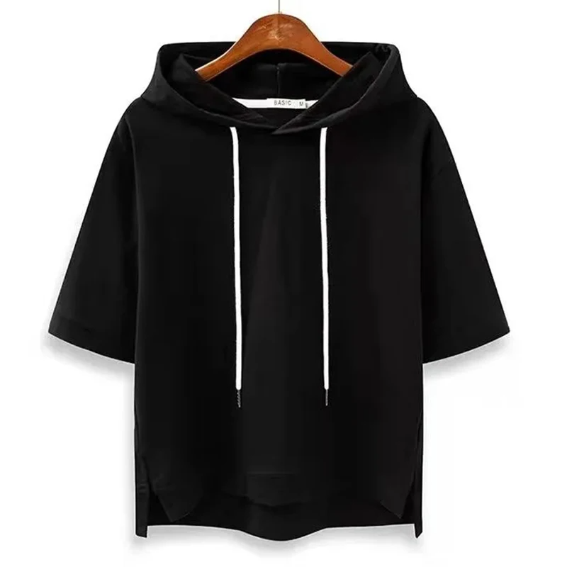 Minimalist women's short sleeve boxy hoodie, versatile layering top. Breathable fabric, relaxed for casual style.