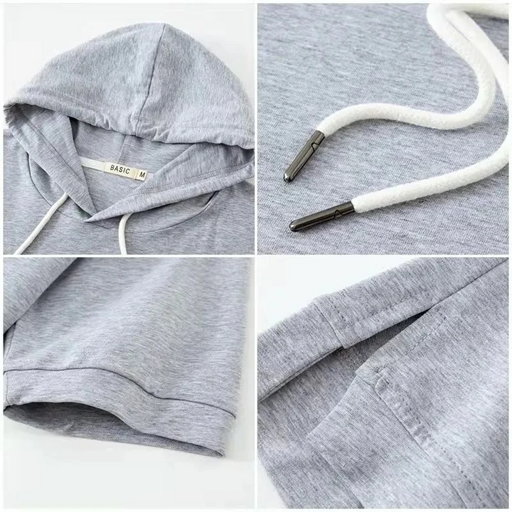 Women's short sleeve boxy hoodie with a split hem. Breathable cotton blend, relaxed fit for casual spring fashion.