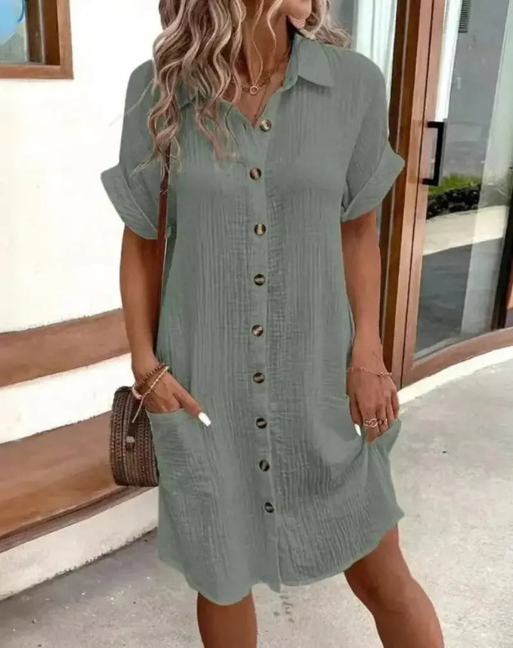 Stylish women's button-down shirt dress, collared & short-sleeved. Ideal casual midi dress for spring and summer.