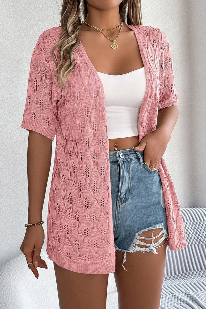 Versatile women's short sleeve crochet cardigan for chic layering over dresses or tops.