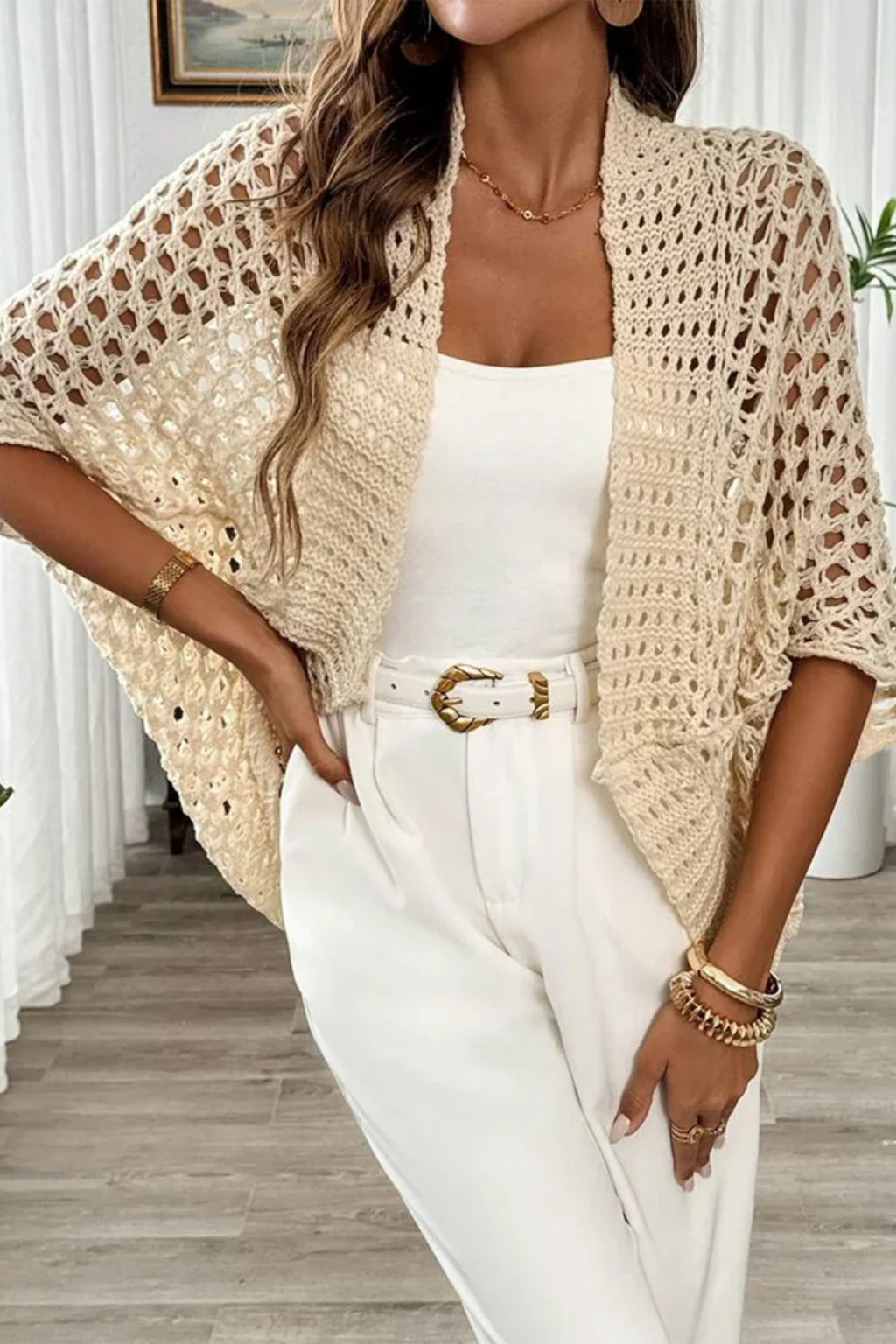 Textured knit women's short sleeve crochet cardigan, a lightweight cover-up perfect for casual elegant spring styles.