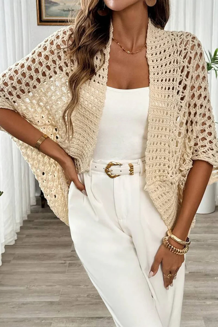 Textured knit women's short sleeve crochet cardigan, a lightweight cover-up perfect for casual elegant spring styles.