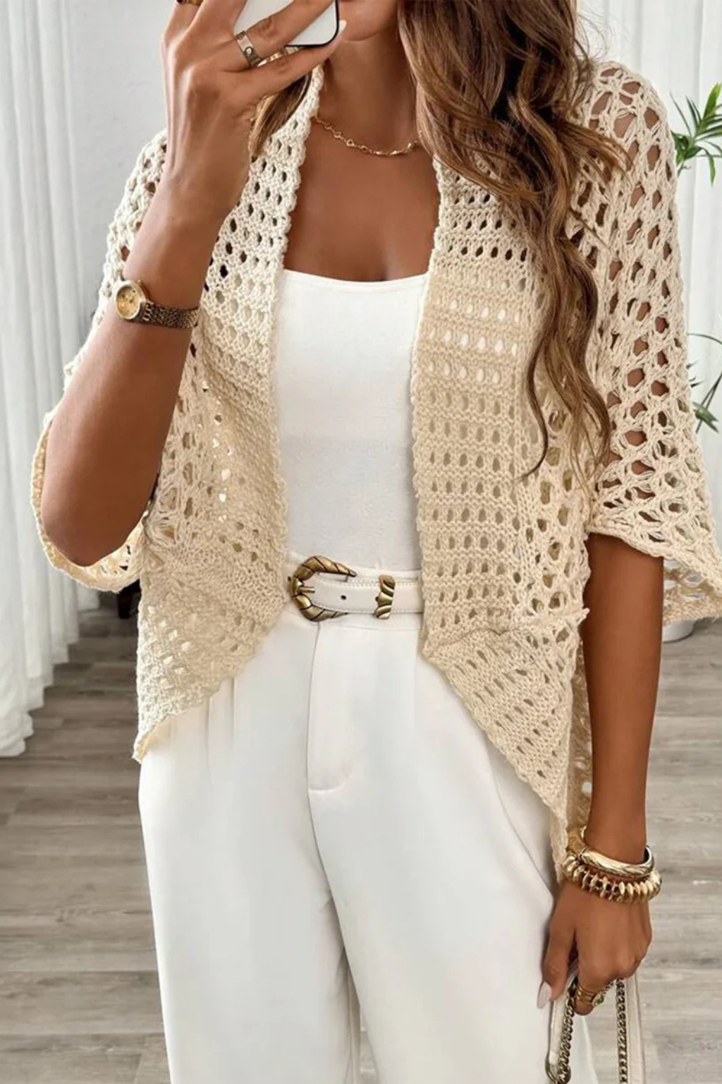 Lightweight women's short sleeve crochet cardigan, an easy open front layering top for warm spring and summer days.
