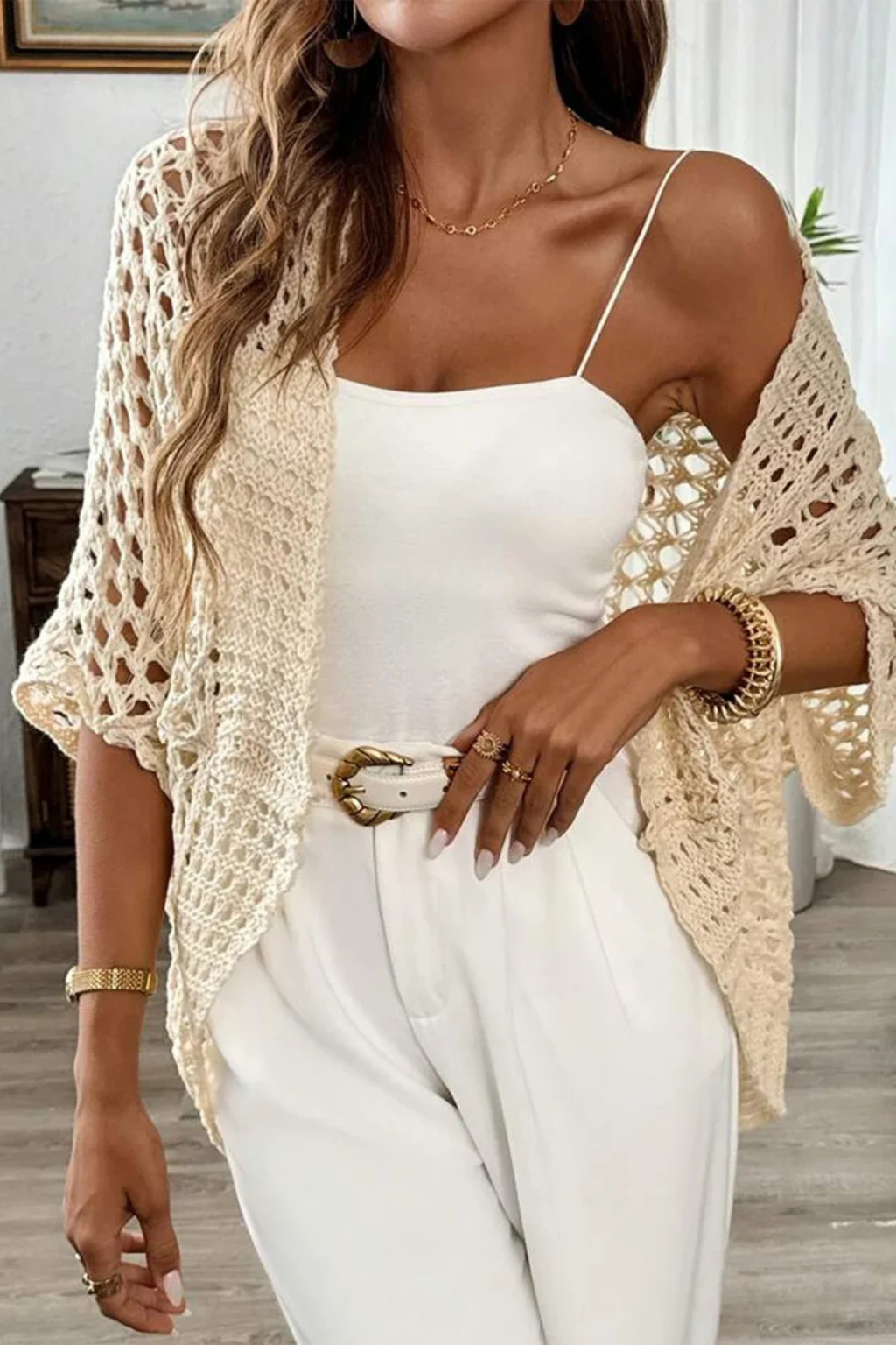 Women's short sleeve crochet cardigan with a textured knit, a lightweight, casual elegant layering piece for spring.