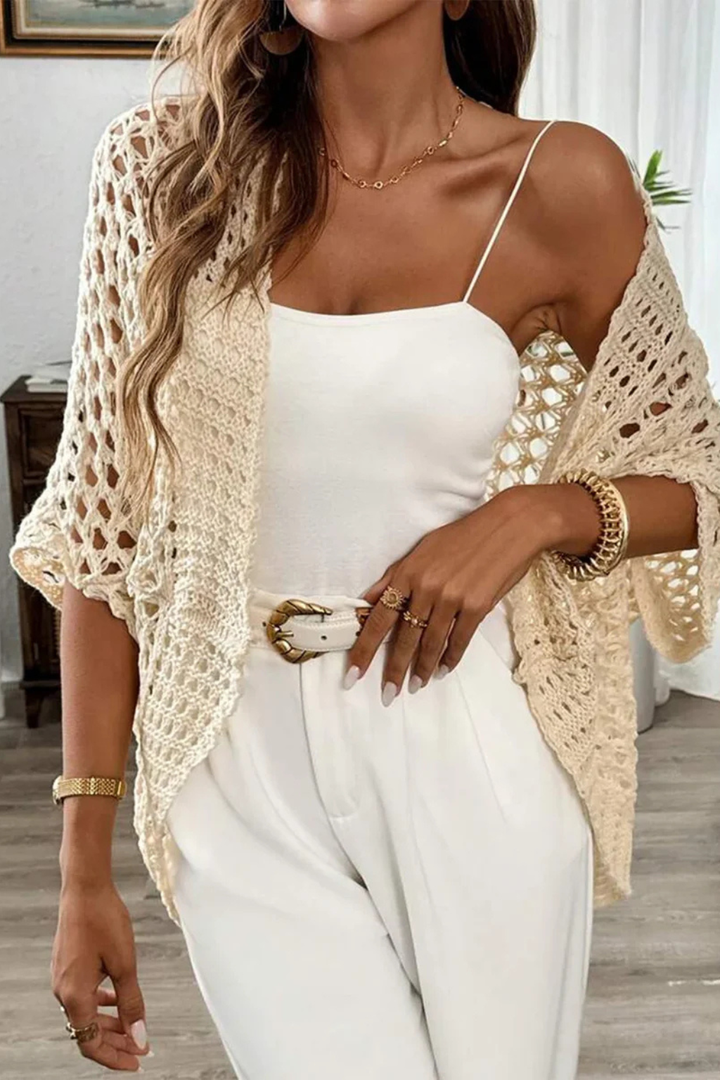 Women's short sleeve crochet cardigan with a textured knit, a lightweight, casual elegant layering piece for spring.