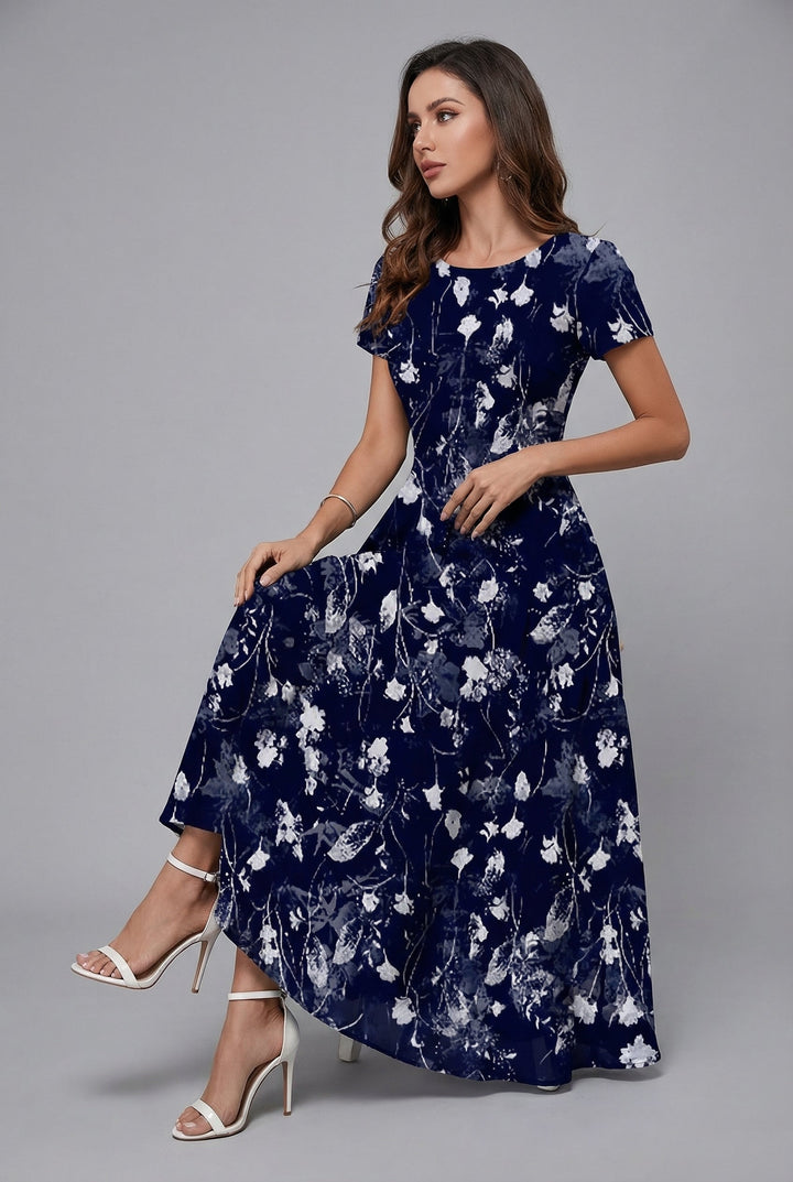 Flowy floral print midi dress with a crew neck, ideal for summer.