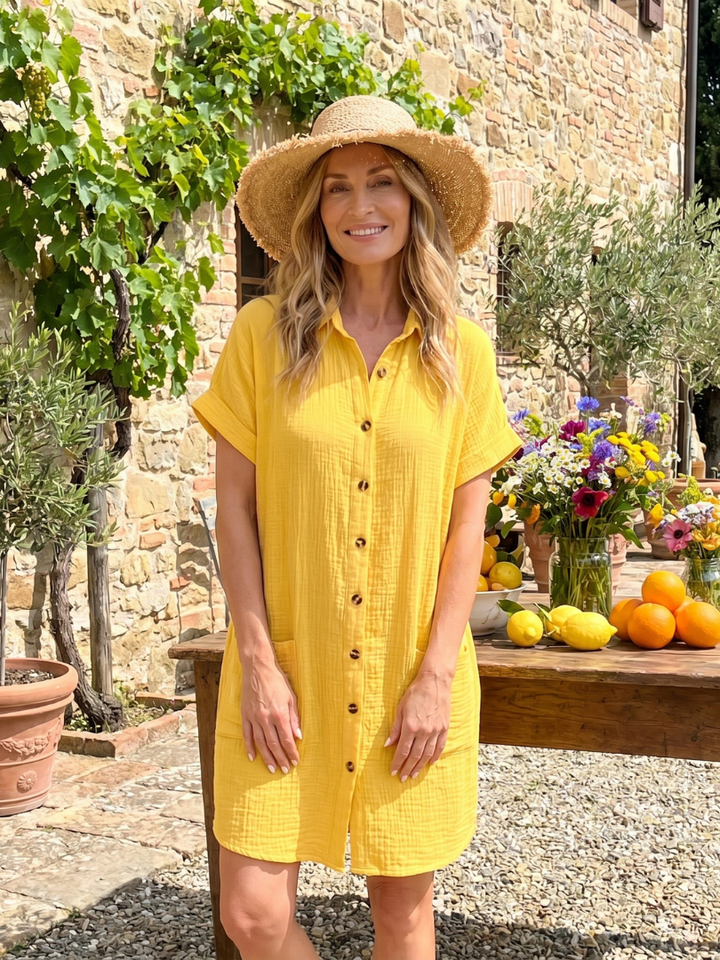 Stylish women's knee length short sleeve dress with pockets, ideal for versatile casual outfits.