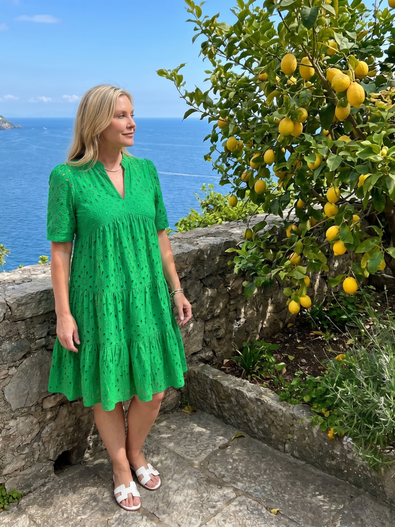 Women's summer short sleeve dress with delicate eyelet details. Knee-length, relaxed, perfect for everyday comfort.