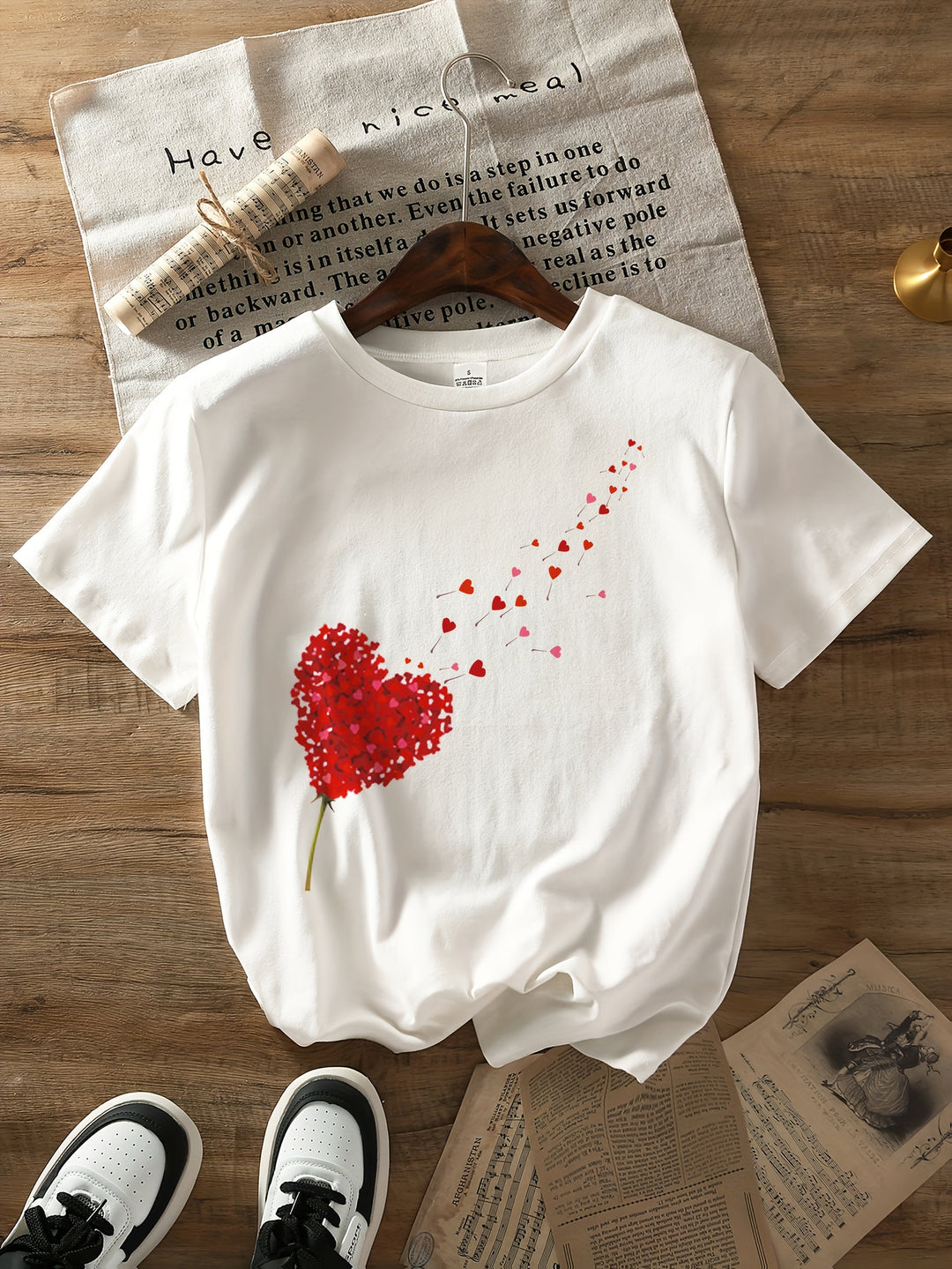 Women's heart and floral print t-shirt. Round neck, short sleeve design for a romantic, everyday casual wear look.