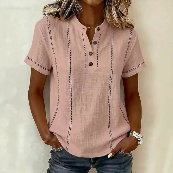 Effortless women's textured henley-style button top. Versatile short sleeve shirt for casual everyday fashion.