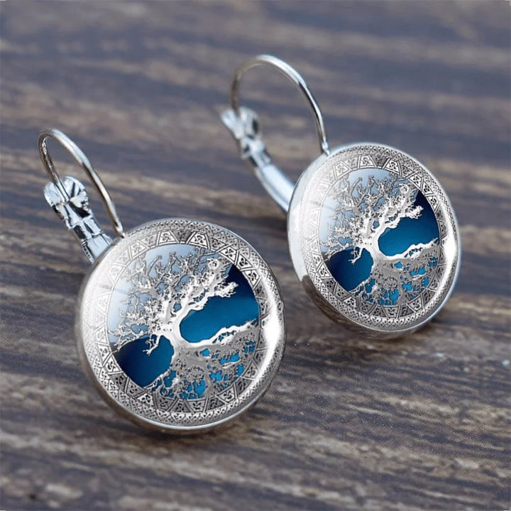 Women's silver Tree of Life hoop earrings with secure lever back. Elegant spiritual jewelry, perfect gift.