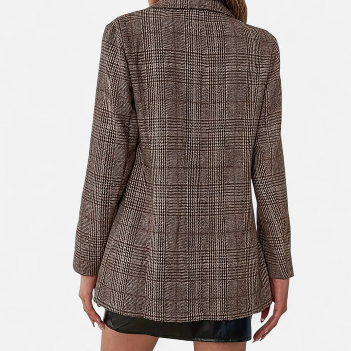 Shop this women's plaid blazer: a classic, single-breasted, tailored fit for elegant style.