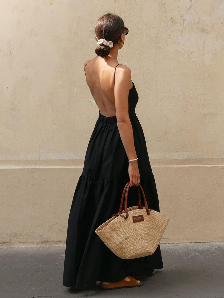 Women's sleeveless backless midi summer dress, perfect for elegant casual wear & vacation. Flowy and comfortable.