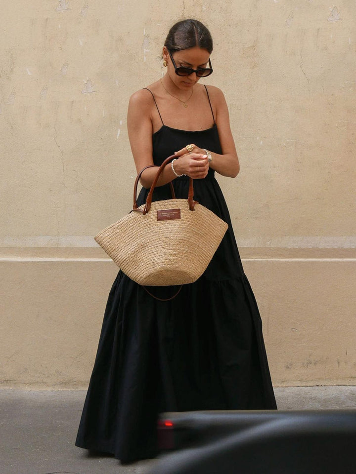 Comfortable women's sleeveless backless midi dress. A flowy design, great for casual summer days & holiday wear.