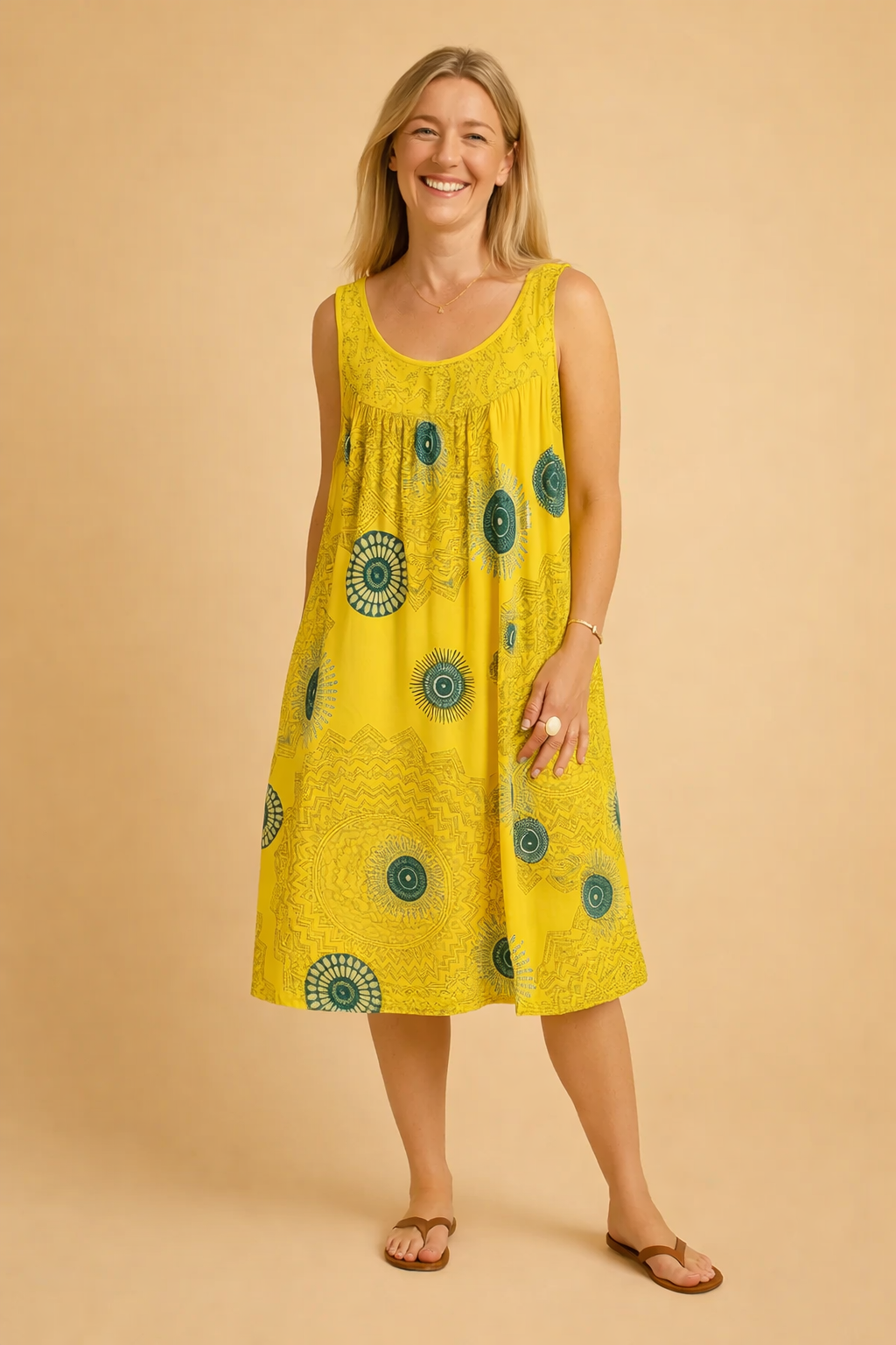 Stylish women's bohemian sleeveless midi dress. Comfortable and airy for summer casual or vacation looks.