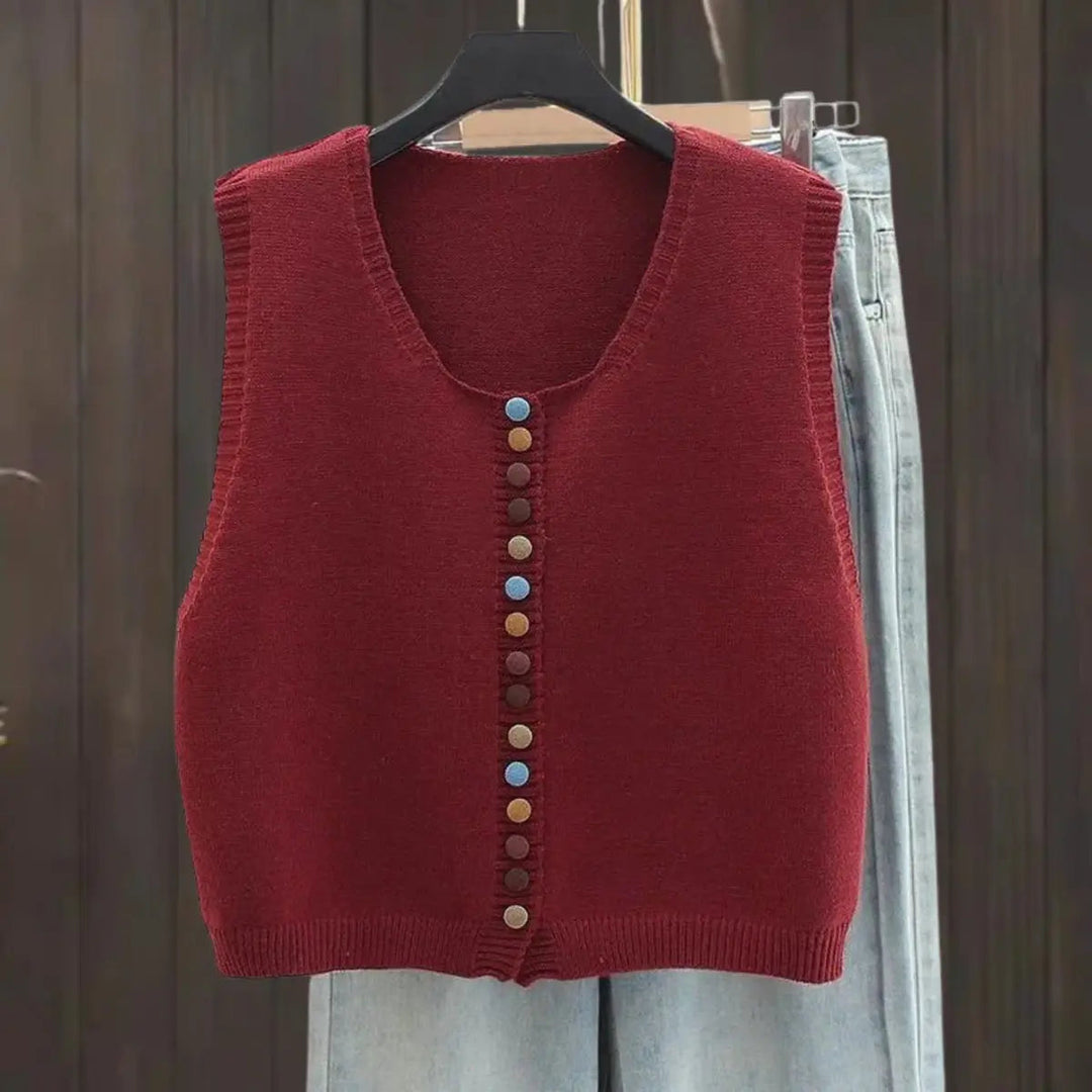 Women's sleeveless button-front vest cardigan with vibrant multi-color buttons. Casual & chic layering piece.