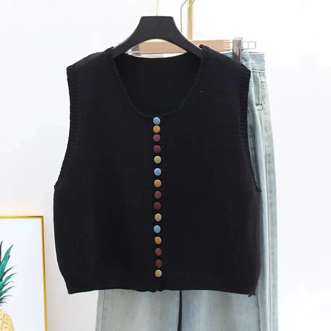 Chic women's button-front vest. Sleeveless cardigan vest featuring a round neck & stylish multi-color buttons.