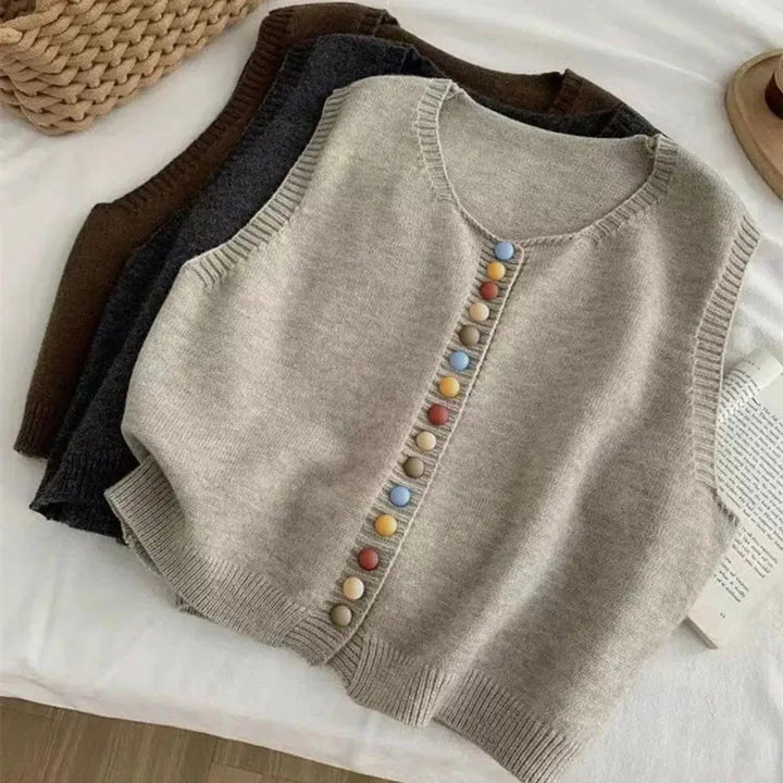 All-season women's sleeveless vest with a button-front closure & charming multi-color buttons. Great for layering.
