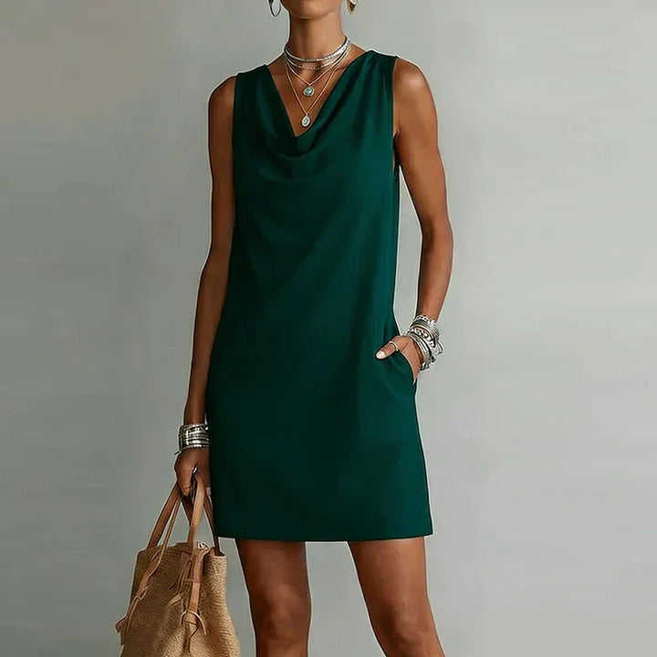 Women's sleeveless cowl neck mini dress, an elegant and comfortable A-line summer outfit.