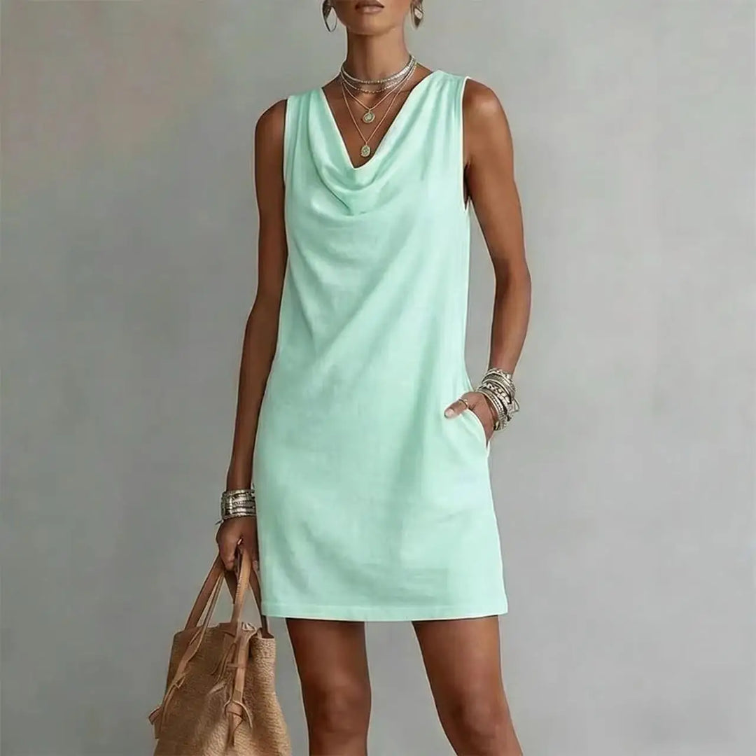 Effortless women's mini dress, featuring a sophisticated cowl neck and sleeveless design for ultimate summer comfort.