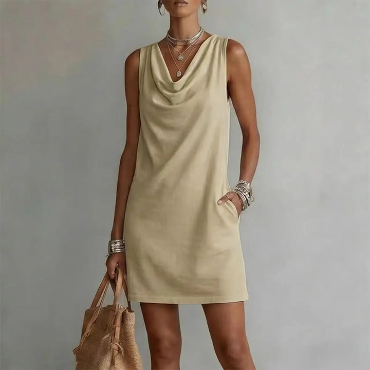 Stylish women's sleeveless cowl neck A-line mini dress, a comfortable & versatile smart-casual summer option.