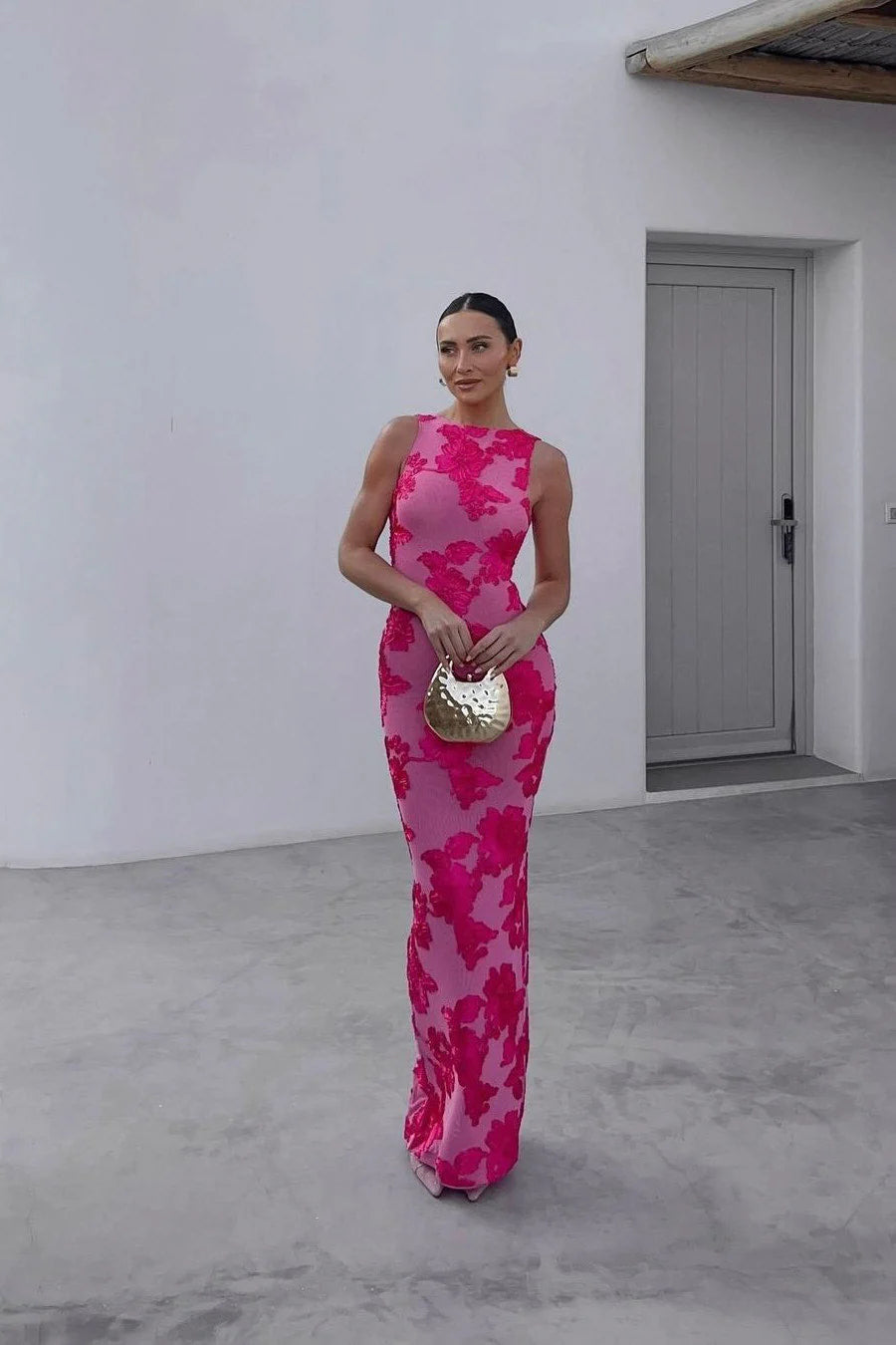 Elegant women's sleeveless evening maxi dress with beautiful floral embroidery detail