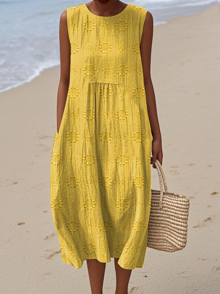 Elegant women's sleeveless midi dress with a flattering round neck, versatile for casual or dressier summer outings.