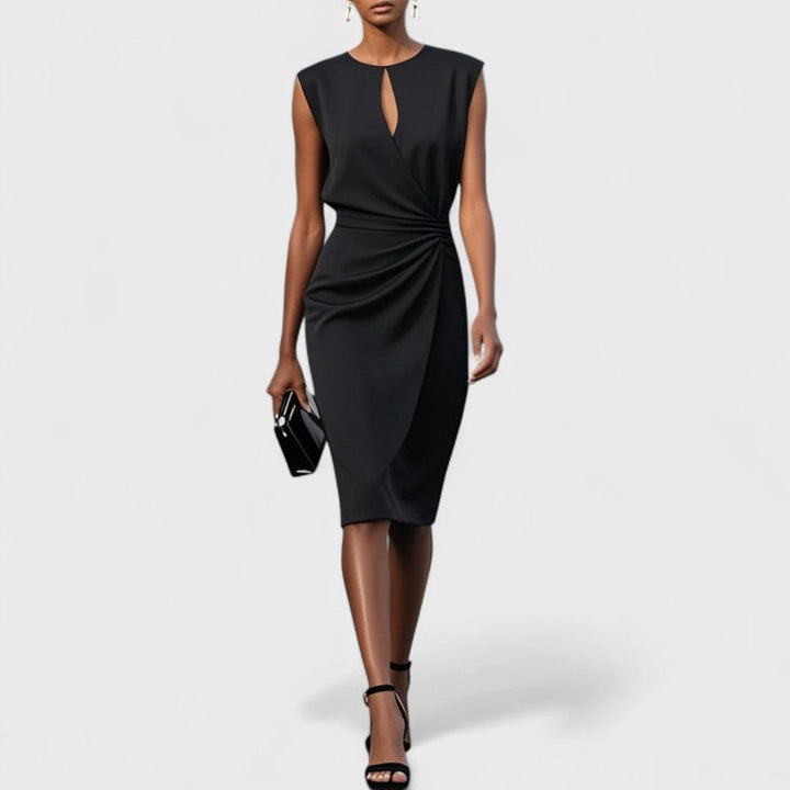 Structured sleeveless midi dress featuring a stylish keyhole and chic wrap-around waist.