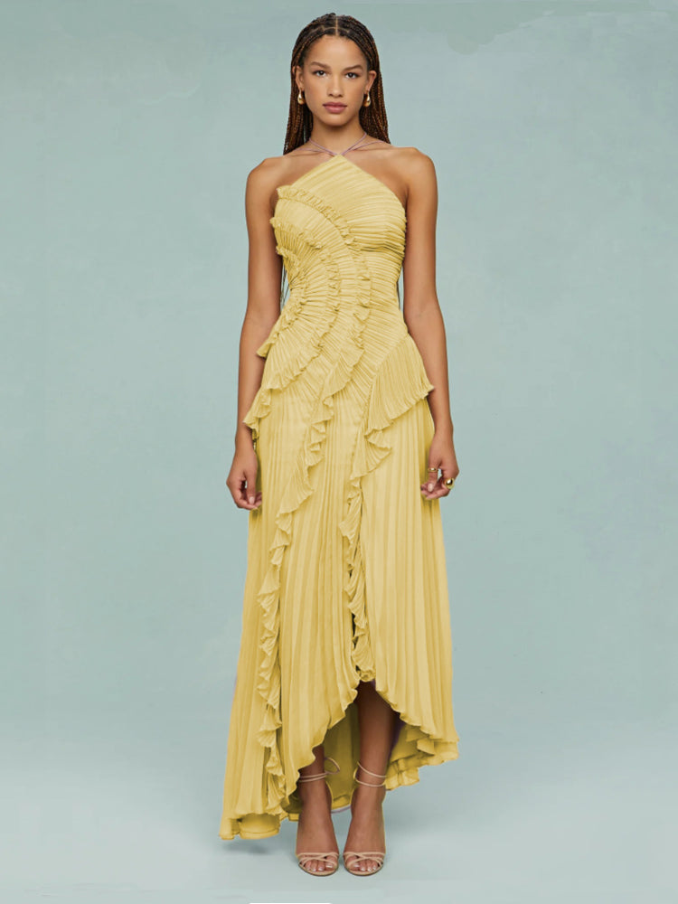 Sophisticated wedding guest maxi dress, sleeveless with elegant pleats and an asymmetric cut.