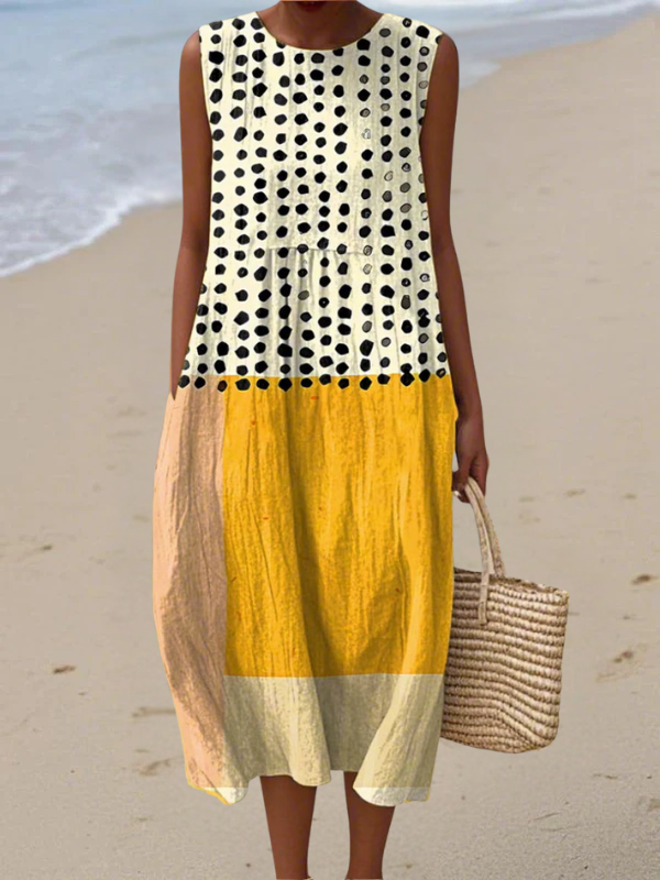 Women's sleeveless polka dot colorblock midi dress. Comfortable, casual summer style with a flattering fit.