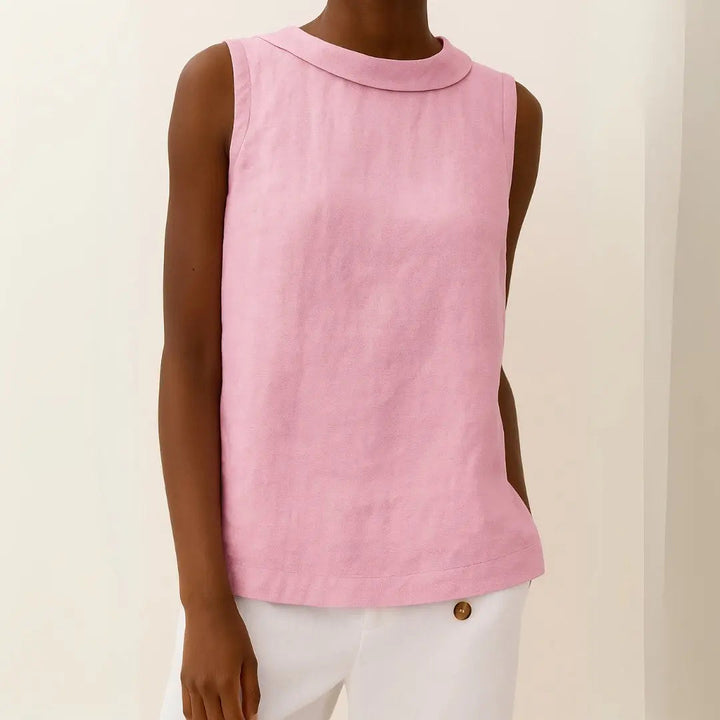 Casual chic women's sleeveless roll collar top. Relaxed fit blouse for comfortable and stylish summer fashion.