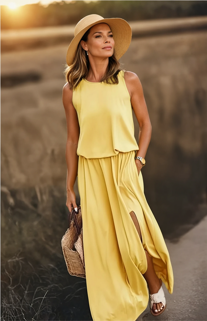 Elegant women's sleeveless maxi dress with a round neck, perfect for versatile summer outfits.