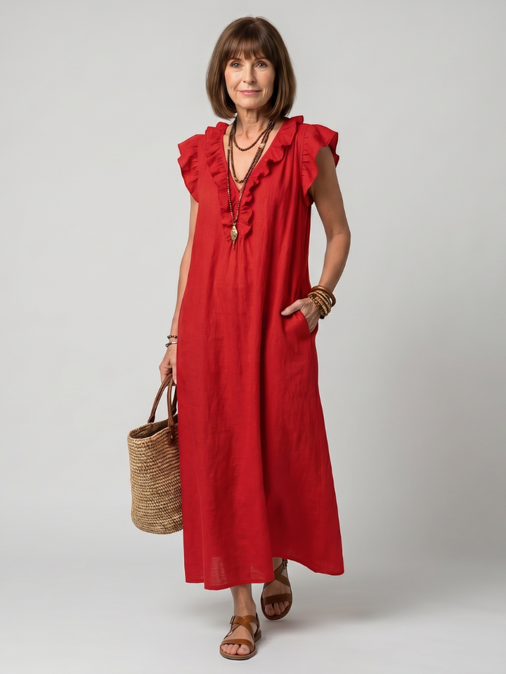 Beautiful women's sleeveless midi dress, features ruffle trim, ideal for a breezy summer look.