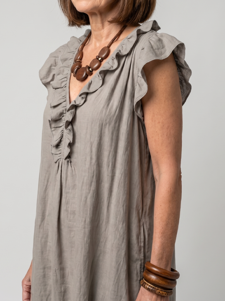 Versatile women's sleeveless ruffle trim midi dress, great for casual or elegant events.
