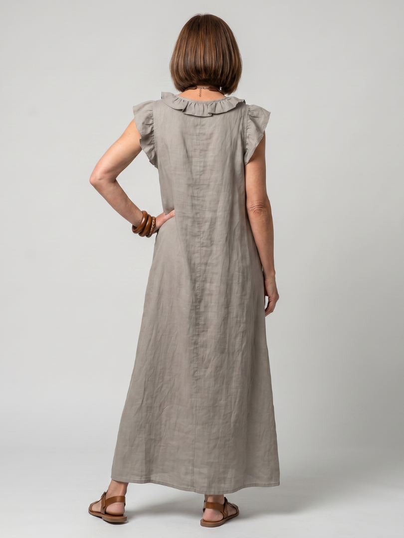 Flowy women's sleeveless midi dress featuring chic ruffle trim, ideal for warm weather.