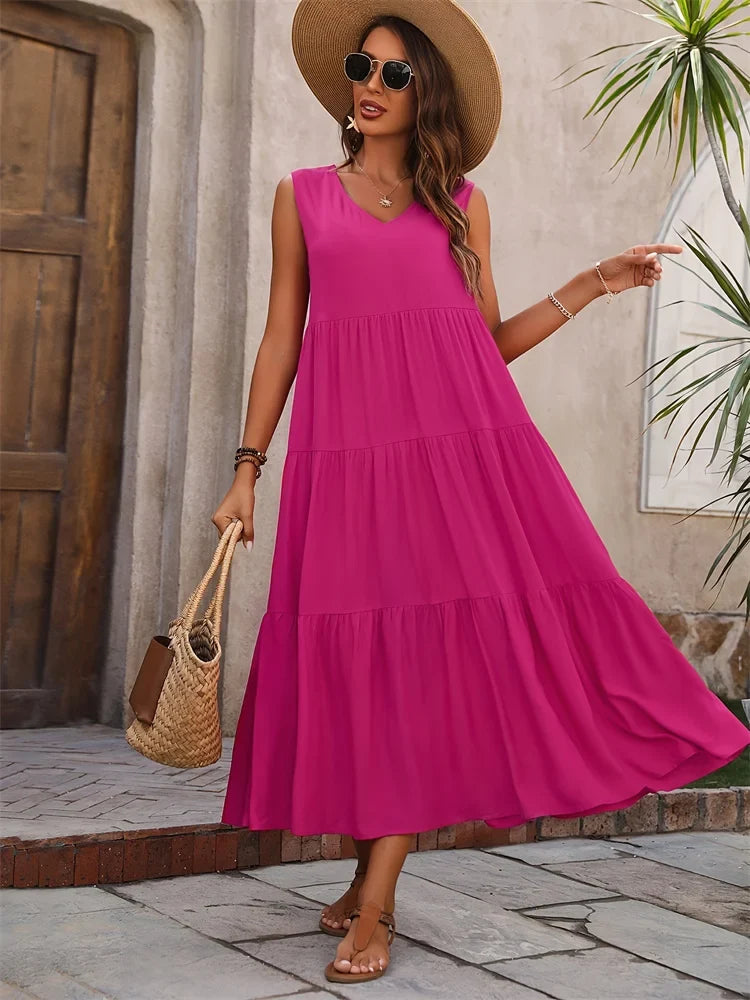 Vacation-ready women's maxi dress, a flowy tiered sleeveless design.