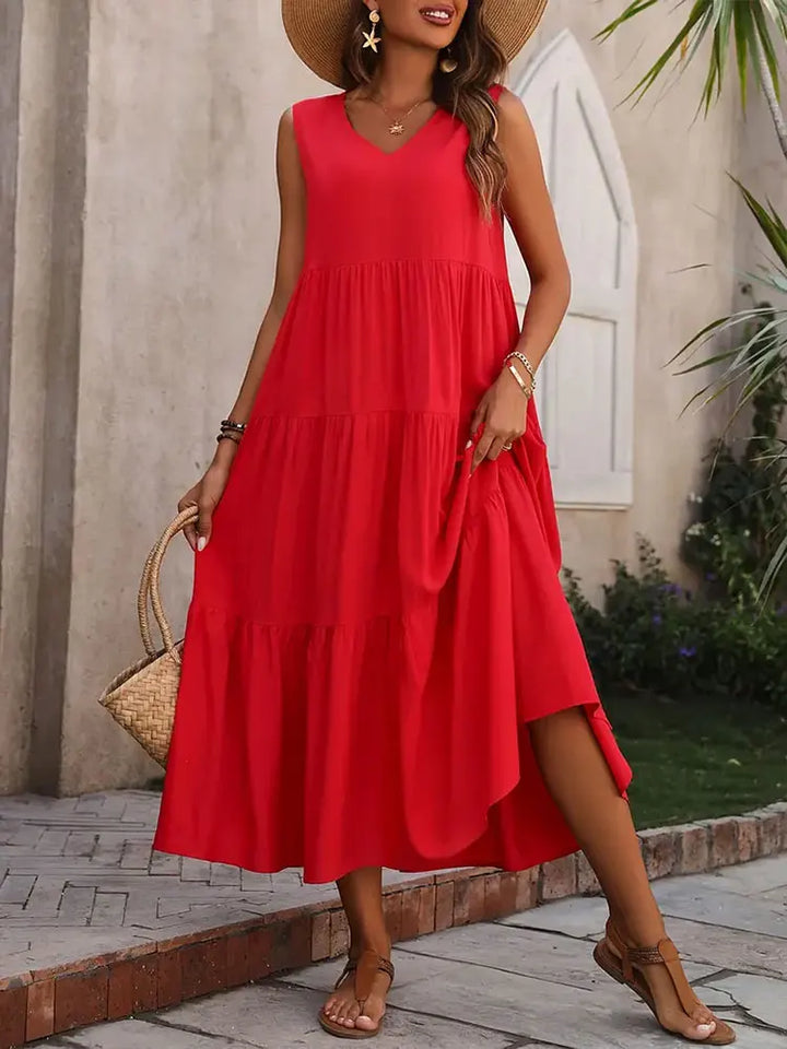 Chic casual V-neck maxi dress, tiered for a comfortable summer feel.