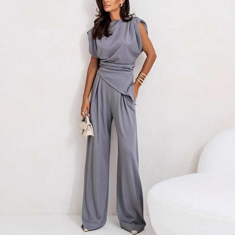 Casual women's sleeveless top and wide-leg trousers set. Perfect for spring & summer.