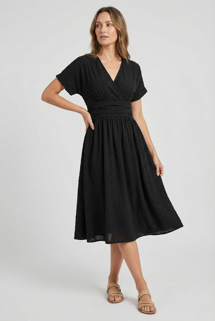 Sleeveless pleated midi dress, a chic option for cocktail events