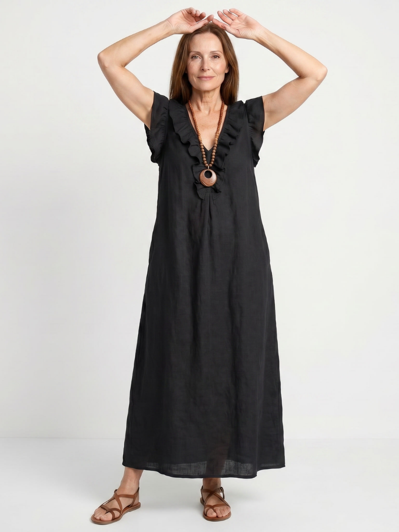 Stylish women's spring/summer midi dress, sleeveless, V-neck, with unique ruffle accents.