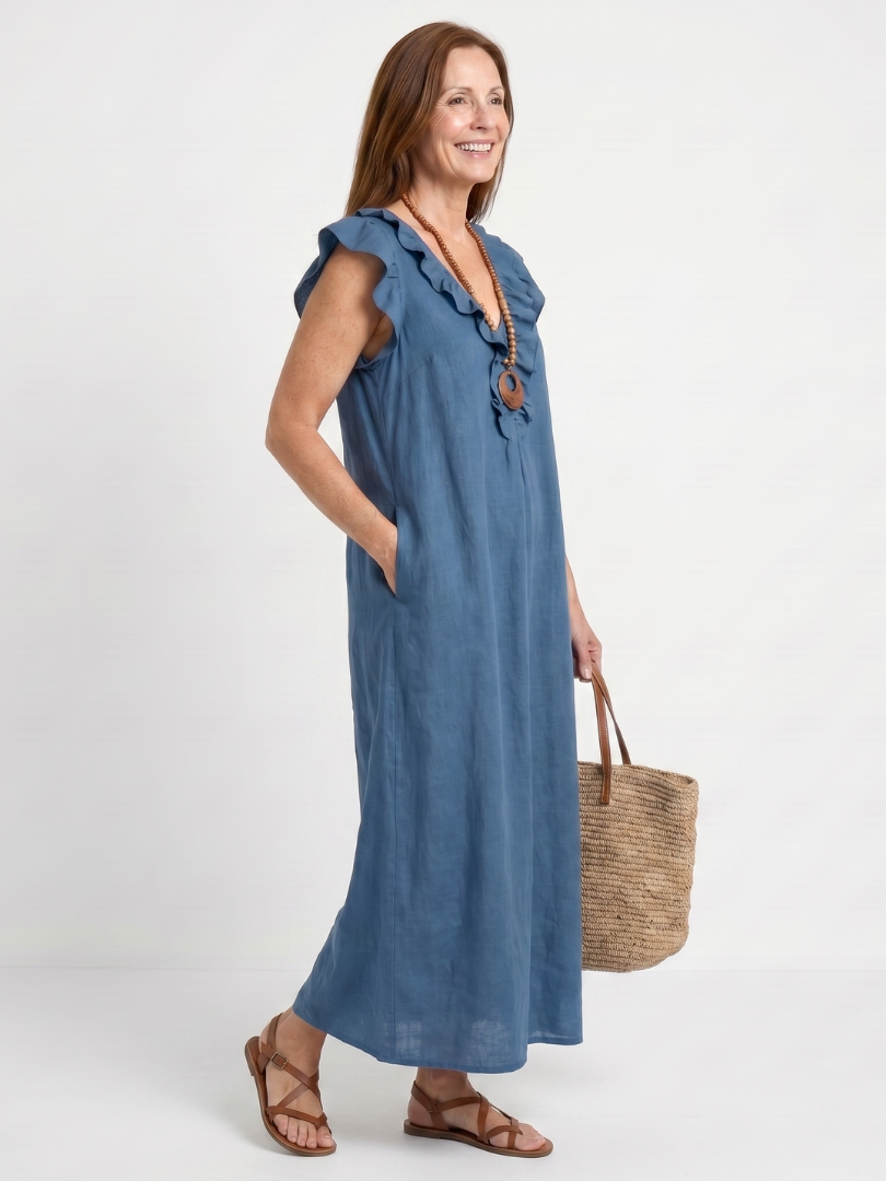Comfortable women's midi dress, V-neck, sleeveless, featuring chic ruffle details & side pockets.