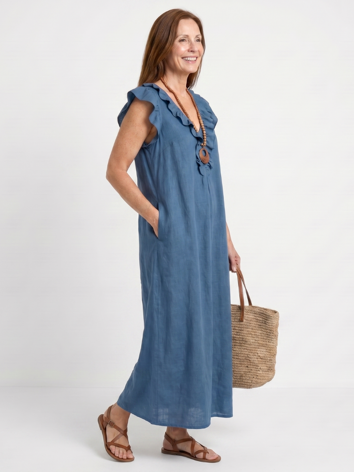 Comfortable women's midi dress, V-neck, sleeveless, featuring chic ruffle details & side pockets.