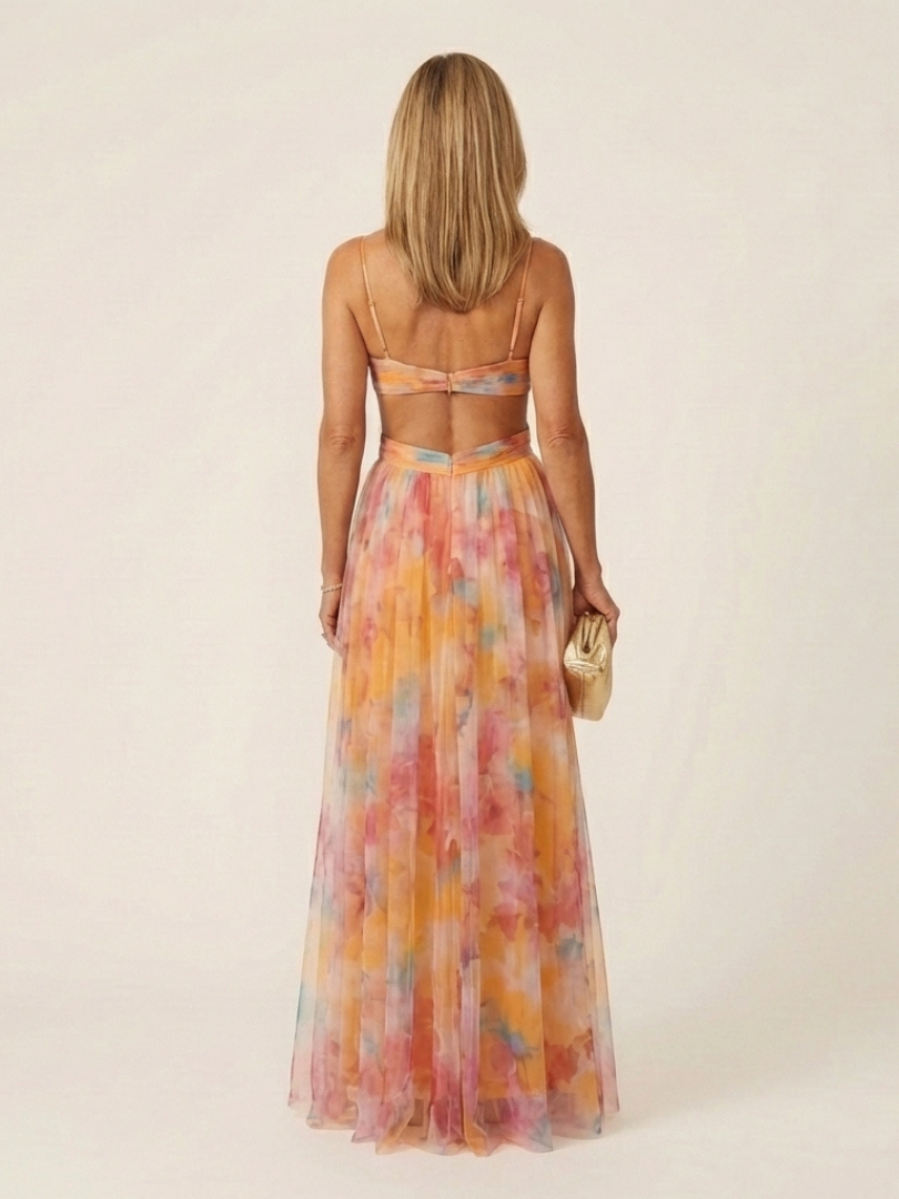 Elegant women's pleated maxi dress, sleeveless with a V-neck, offering a comfortable and flowing fit.