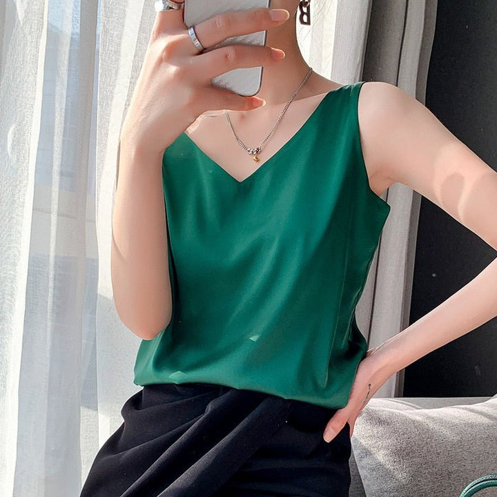Smooth finish V-neck sleeveless top for women, offering effortless elegance and modern style.