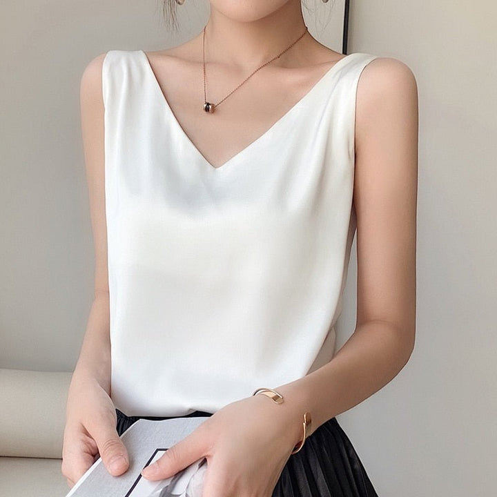 Stylish women's V-neck sleeveless top, an essential piece for versatile casual or dressed-up looks.