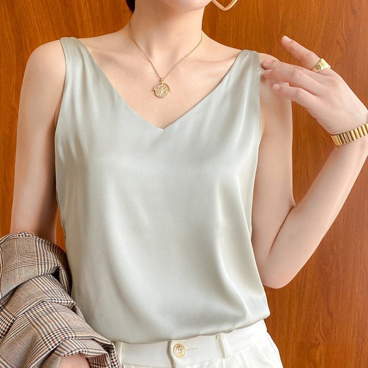 Simple yet sophisticated women's sleeveless V-neck top, great for effortless elegance & summer comfort.