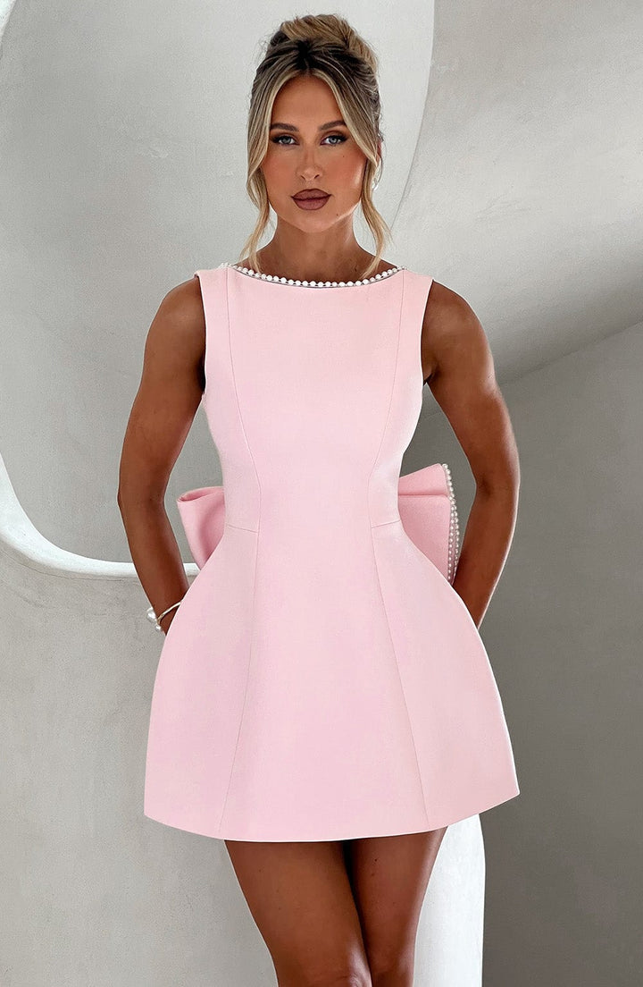 Women's sleeveless wedding guest mini dress, perfect for cocktail parties & formal events.