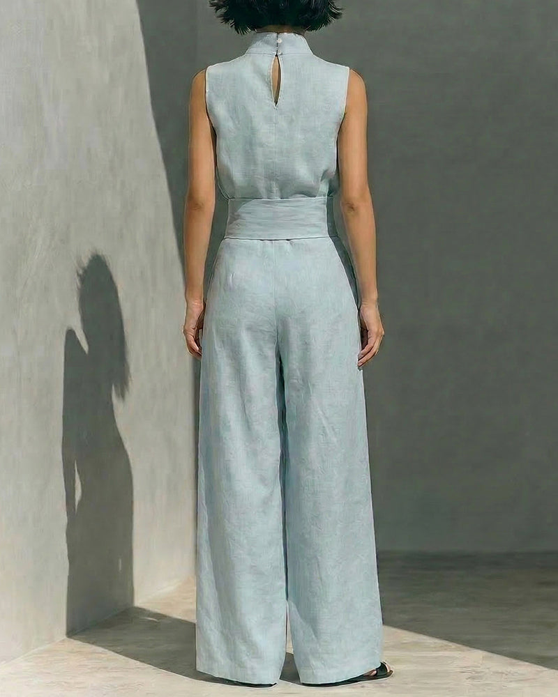 Minimalist women's sleeveless wide leg jumpsuit, a versatile piece for casual or chic spring/summer.